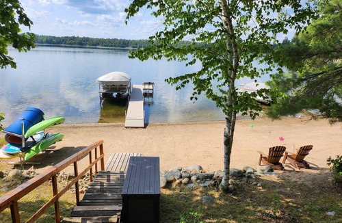 Nevis Cabin | Private lake cabin. WiFi, Beach, Pontoon Rental. Booking for summer of 27!