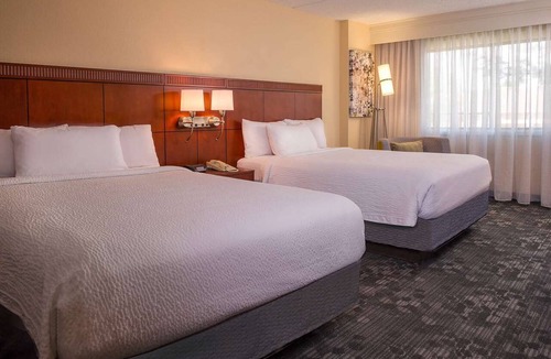 University Place Hotel | Recharge on a Pet Friendly Suite & Access to Pool |Near Charlotte Motor Speedway