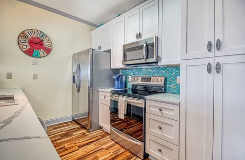 Carolina Yacht Landing Condo | Riverfront condo with WiFi, washer/dryer, central AC, balcony with a view