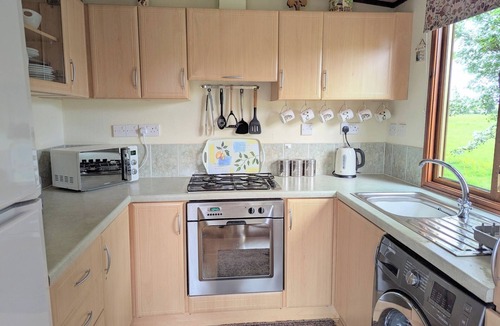 Tiddington Cabin | Riverside Wooden Lodge with amazing views of the River Avon, Stratford-upon-Avon