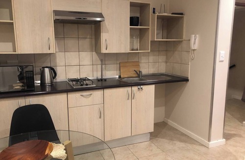 Greater Johannesburg Metropolitan Area Apartment | Secure Executive Apartment, WiFi, Solar Power, Netflix