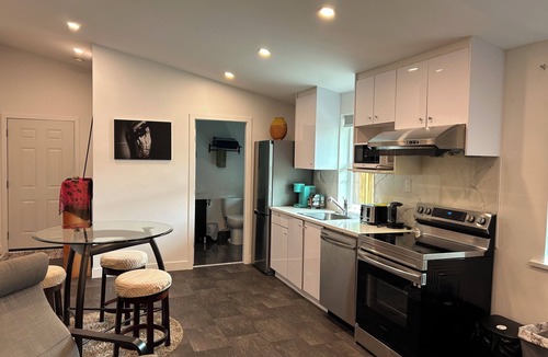 Upper Lonsdale Apartment | Self-Contained Suite w/Shared Pool, Hot Tub, Views