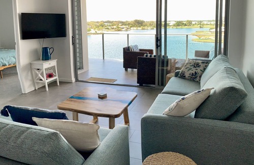 Birtinya Apartment | Serene coastal waterfront apartment, private oasis, daily sunrises over ocean.