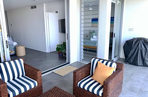 Birtinya Apartment | Serene coastal waterfront apartment, private oasis, daily sunrises over ocean.