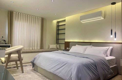 Al Duqqi Apartment | Spacious 4-bedroom apartment in lovely Giza with AC, WiFi
