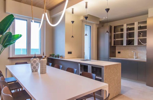Fano Apartment | Super Beachfront Penthouse for Families with Breakfast, 2 Parking Spaces, Private Beach