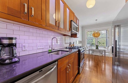 Cherry Condo | The Home Collection: Historic Myers Park 2BR/2BA | Step-Free | Screened Porch