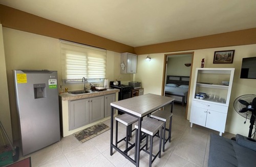 Charlotteville Apartment | Topriver View 1-bd Apt - 5 min walk to beach in perfect Charlotteville with AC