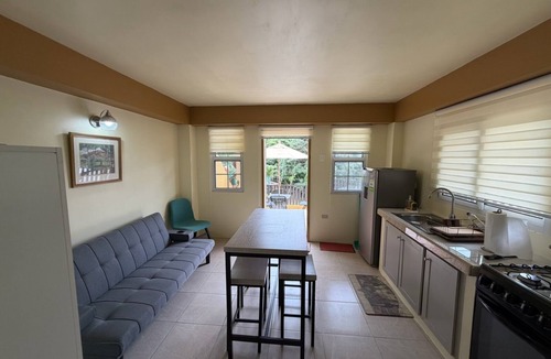 Charlotteville Apartment | Topriver View 1-bd Apt - 5 min walk to beach in perfect Charlotteville with AC