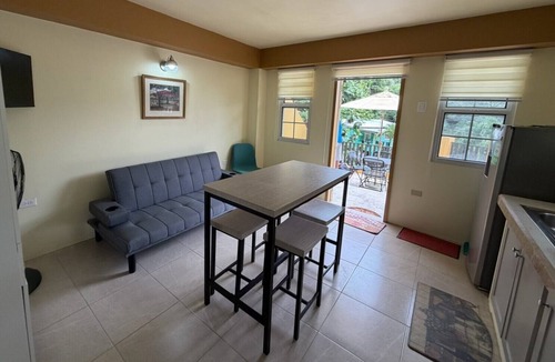 Charlotteville Apartment | Topriver View 1-bd Apt - 5 min walk to beach in perfect Charlotteville with AC