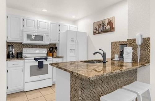 Venetian Bay Villages House | Townhome near Disney! Gated complex, 3 pools, hot tub, Playstation 5 w/games