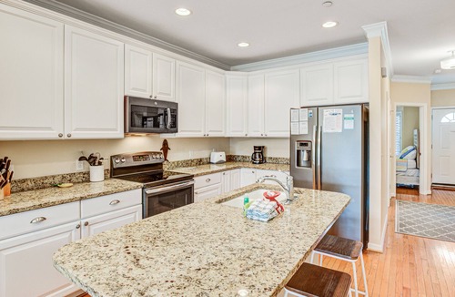 Waters Edge Villa | Townhome with marsh/river views & community pool/fishing pier!