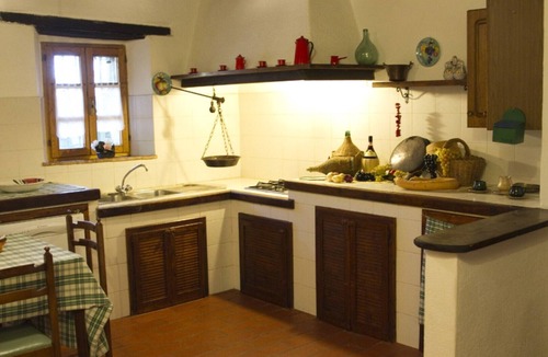 Castelnuovo di Val di Cecina Apartment | Traditional Tuscan apartment in a cozy vacation farmhouse.
