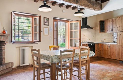 Ca' de' Grimaldi House | Tranquil Village Stay with Fireplace
