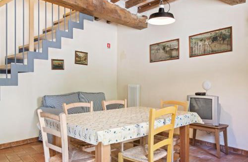 Ca' de' Grimaldi House | Tranquil Village Stay with Fireplace