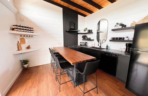 East Dubuque Cabin | Trendy 2-bedroom floating cabin on river backwaters with HOT TUB!