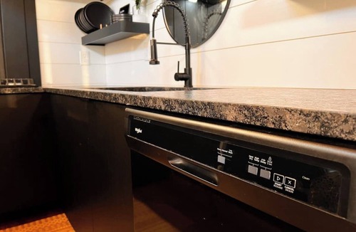East Dubuque Cabin | Trendy 2-bedroom floating cabin on river backwaters with HOT TUB!