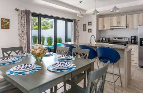Potrero House | Ultramodern Townhome with an Inviting Coastal Design and Lush Outdoor Oasis with a Private Pool