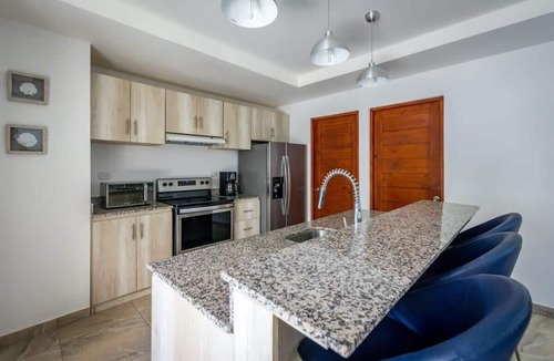 Potrero House | Ultramodern Townhome with an Inviting Coastal Design and Lush Outdoor Oasis with a Private Pool