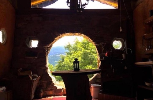Villa Minozzo Cabin | Unique offgrid forest cabin, hand built using recycled materials.