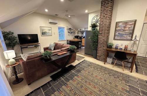 Yachting Village Apartment | Unwind in harbor luxury at this sophisticated studio in Newport's Yachting Village! Cozy queen bed + pull-out sofa bed, fully stocked kitchen, huge deck with sunset harbor views, mini-split AC, TV, off-street parking. Steps to marinas, Thames Street