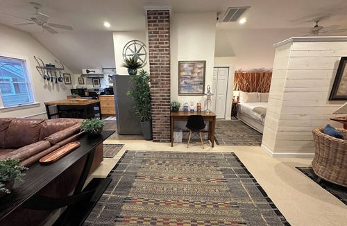 Yachting Village Apartment | Unwind in harbor luxury at this sophisticated studio in Newport's Yachting Village! Cozy queen bed + pull-out sofa bed, fully stocked kitchen, huge deck with sunset harbor views, mini-split AC, TV, off-street parking. Steps to marinas, Thames Street