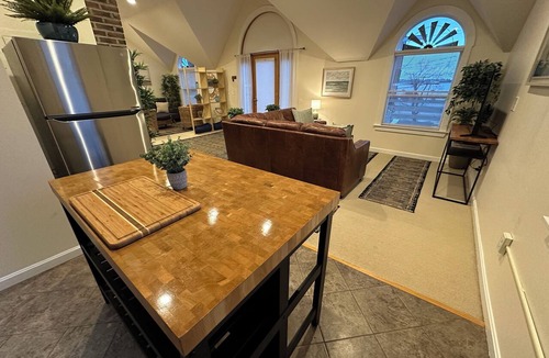 Yachting Village Apartment | Unwind in harbor luxury at this sophisticated studio in Newport's Yachting Village! Cozy queen bed + pull-out sofa bed, fully stocked kitchen, huge deck with sunset harbor views, mini-split AC, TV, off-street parking. Steps to marinas, Thames Street