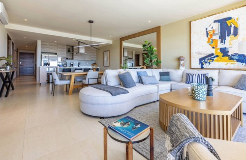 Juarez Condo | Vista Del Arco at Vista Vela Sunset is a modern 3-bedroom condo with ocean and sunset views, an open layout, and top resort amenities. Enjoy pickleball courts, a fully equipped gym, and a pool just steps from the patio—ideal for a relaxing Cabo stay.