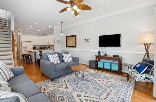 Waters Edge House | Water's Edge 103 - Bright 3BR/3BA Townhome - Pool - Fishing Dock