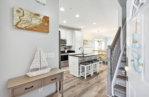 Waters Edge House | Water's Edge 114 - River Daze - Premier Riverfront Townhome - Pool & Fishing Pier!