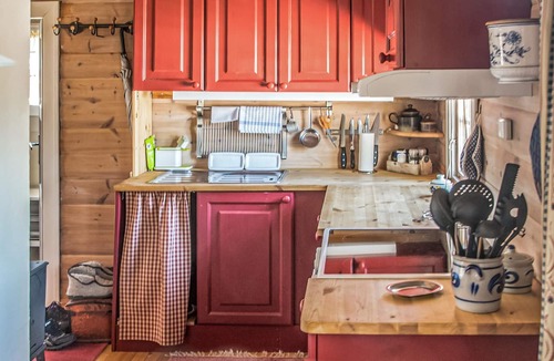 Amot House | Wonderful cottage with its own fireplace on the property.