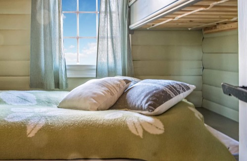Amot House | Wonderful cottage with its own fireplace on the property.