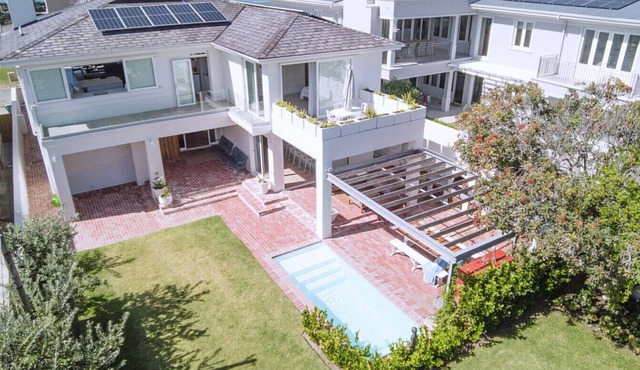 34 Mossel River 12 — Elegant Coastal Retreat | Ocean Views | Poolside Luxury