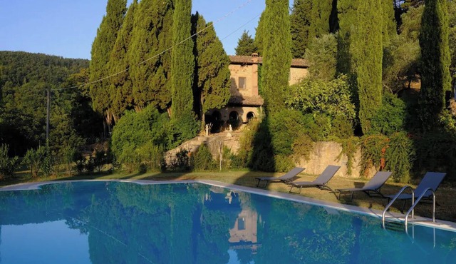 A beautiful Tuscan villa; a large private pool, spacious grounds & cinema room.