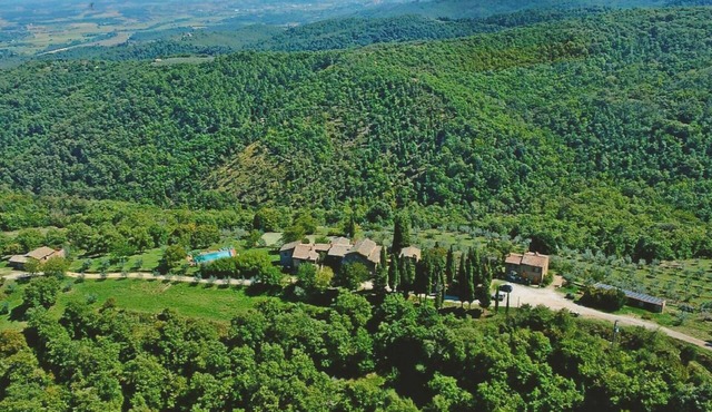 Ancient hamlet in an extremely panoramic position, nestling amidst green woods and hills, a few km f