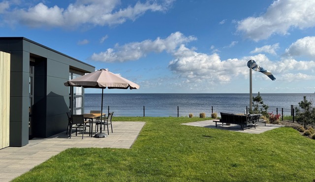 Beachfront Chalet in First Row with Exceptional Sea View and Fenced Garden