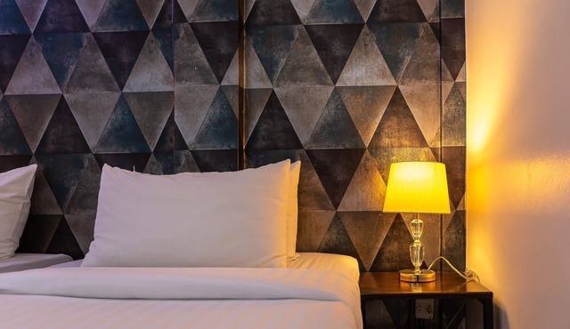 Bed by Tha-Pra Hotel and Apartment