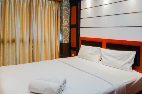Best Price 2BR at Tifolia Apartment By Travelio