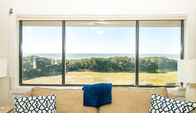 Breathtaking Ocean Front Condo at Caswell Beach. Norah Patrick's Hideaway