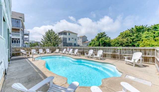 Bright and beautiful semi-oceanfront stunner just steps from the beach!