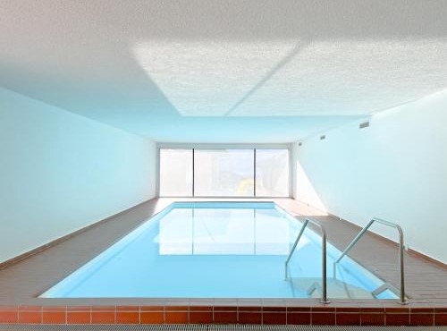 Bright Tiny Studio - Shared Pool & Sauna - Free Parking - Air condition in Muralto