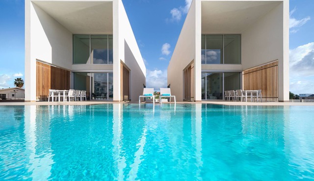 CARAIBAS fully air-conditioned vacation design villa with 20m lap pool