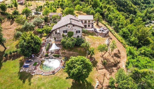 Charming 4-bedroom farmhouse in enchanting Tuscany close to mountains and sea.