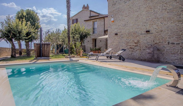 Charming villa with pool nestled in a medieval village in the Marche region, 30 minutes from the sea