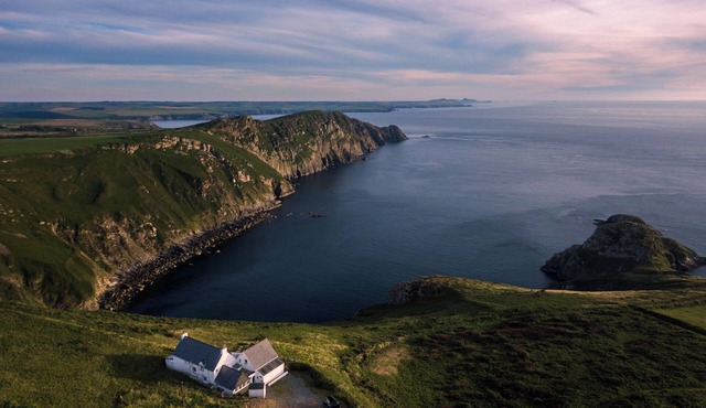 Cliff-top converted farmhouse in the Pembrokeshire Coast National Park.