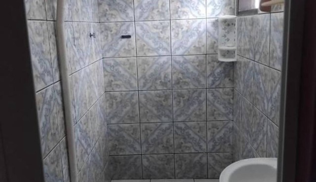 Comfortable accommodation with air conditioning and a fan. Well-Maintained Suite #4