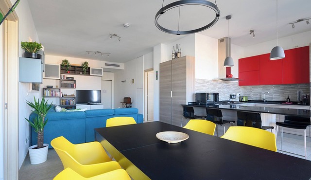Contemporary apartment in the beating heart of Bologna with amazing skyline view