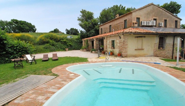 Cosy apartment for 2 people with WIFI, A/C, pool, TV, patio, pets allowed and panoramic view