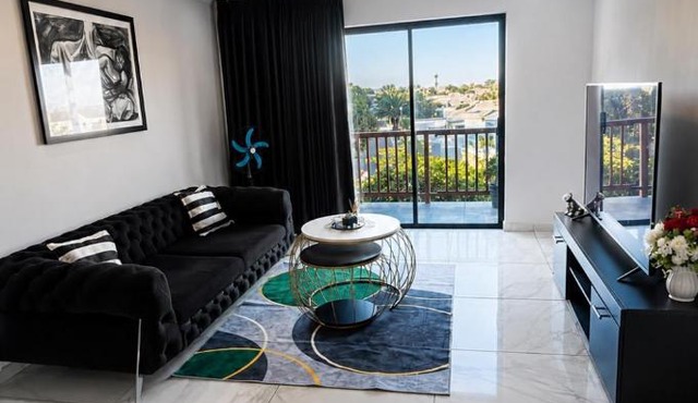 Elegant 1BR Apartment with Balcony