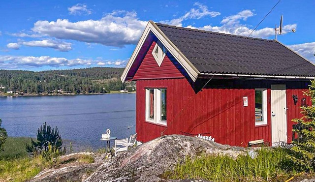 Enjoy a great panoramic view of the water in this vacation home.
